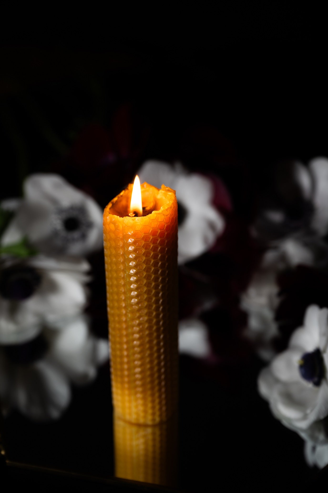 Hand-rolled pure beeswax candle. Handmade with lavender flower. Unscented