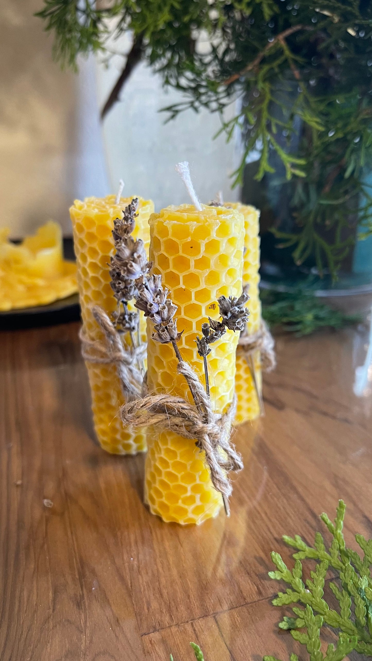 Hand-rolled pure beeswax candle. Handmade with lavender flower. Unscented