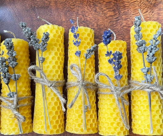 Hand-rolled pure beeswax candle. Handmade with lavender flower. Unscented